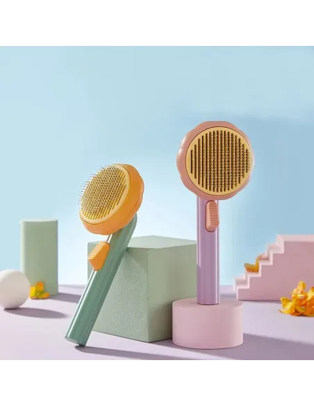 Perie par de animale cu buton de autocuratare