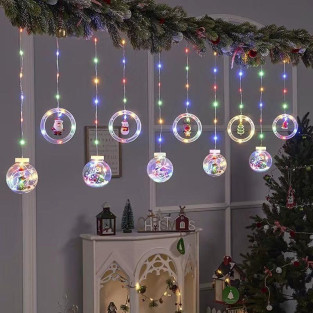 Instalatie led tip perdea cu diferite figurine, cercuri si globuri luminoase