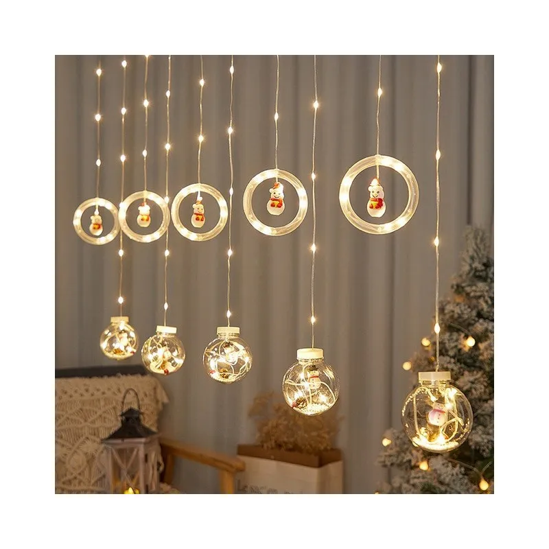 Instalatie led tip perdea cu diferite figurine, cercuri si globuri luminoase