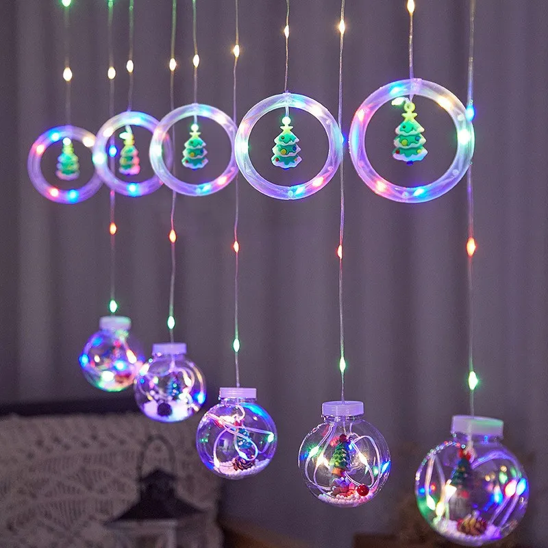 Instalatie led tip perdea cu diferite figurine, cercuri si globuri luminoase